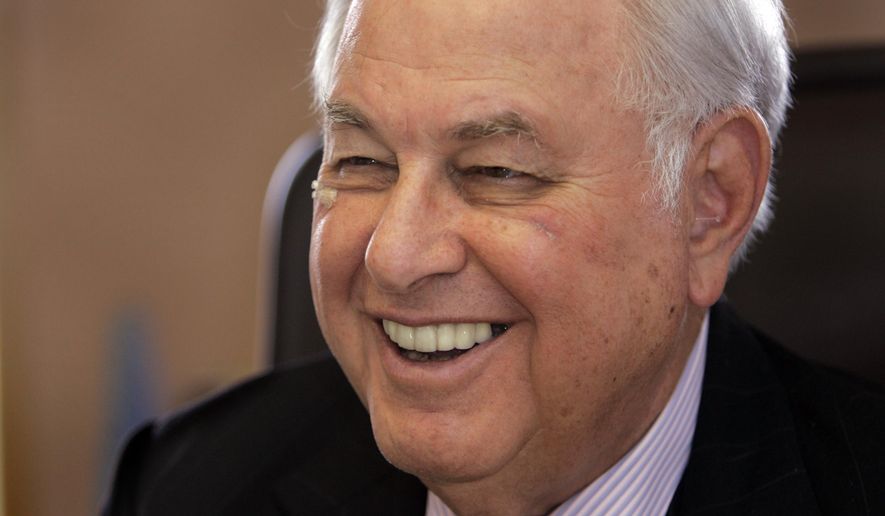 FILE - Real estate mogul and Michigan billionaire A. Alfred Taubman is shown in his office in Bloomfield Hills, Mich., in this April 4, 2007 file photo. Taubman, whose business success and philanthropy was clouded by a criminal conviction late in his career, died Friday night April 17, 2015 at his home after a heart attack. He was 91 (AP Photo/Carlos Osorio, File)