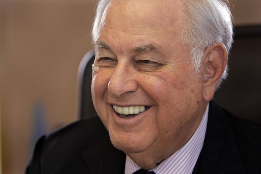 FILE - Real estate mogul and Michigan billionaire A. Alfred Taubman is shown in his office in Bloomfield Hills, Mich., in this April 4, 2007 file photo. Taubman, whose business success and philanthropy was clouded by a criminal conviction late in his career, died Friday night April 17, 2015 at his home after a heart attack. He was 91 (AP Photo/Carlos Osorio, File)