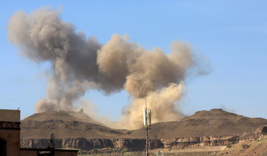 In this photo take on Friday, April 17, 2015, smoke rises after a Saudi-led airstrike on Sanaa, Yemen. Iran's foreign minister urged U.N. Secretary-General Ban Ki-moon on Friday to try to end "the senseless aerial attacks" in Yemen by a Saudi-led coalition and establish a cease-fire. (AP Photo/Shohdi Alsofi)