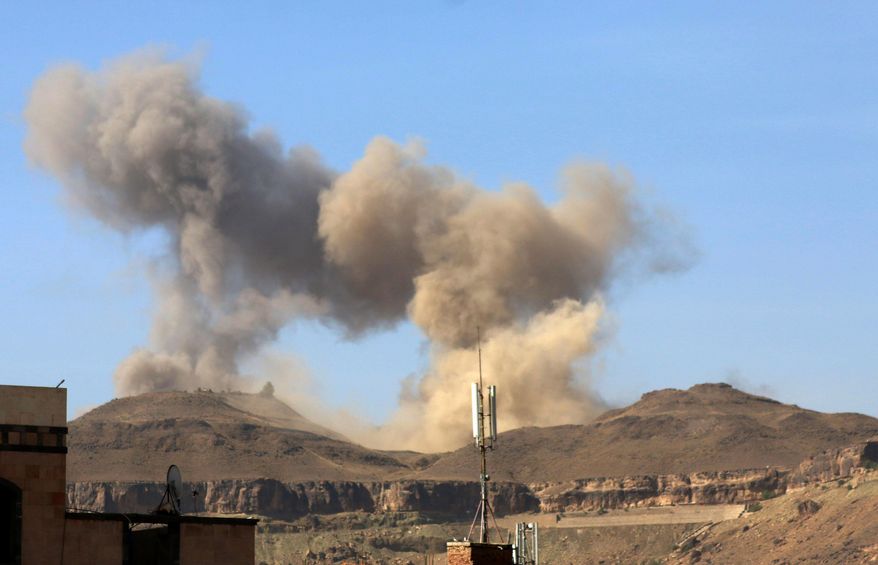In this photo take on Friday, April 17, 2015, smoke rises after a Saudi-led airstrike on Sanaa, Yemen. Iran's foreign minister urged U.N. Secretary-General Ban Ki-moon on Friday to try to end "the senseless aerial attacks" in Yemen by a Saudi-led coalition and establish a cease-fire. (AP Photo/Shohdi Alsofi)