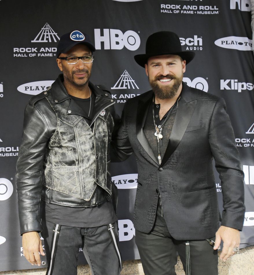 Tom Morello (left), formally of Rage Against the Machine, and Zac Brown arrive at the Rock and Roll Hall of Fame Induction Ceremony Saturday, April 18, 2015, in Cleveland. (AP Photo/Tony Dejak) ** FILE **
