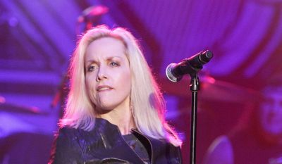 Cherie Currie spoke about the album, the death of her longtime mentor, Kim Fowley, a possible Runaways reunion and chain saws. (Associated Press)