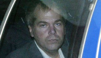 In this Nov. 18, 2003, file photo, John Hinckley Jr. arrives at U.S. District Court in Washington. (AP Photo/Evan Vucci, File)