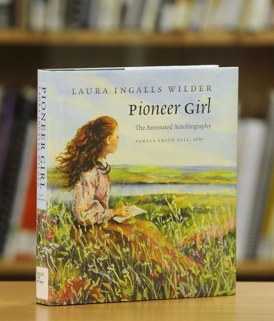 The "Laura Ingalls Wilder Pioneer Girl" book is in the Caille Room at the downtown library in Sioux Falls, S.D., Thursday, Feb. 5, 2015. (Emily Spartz/Argus Leader via AP) NO SALES