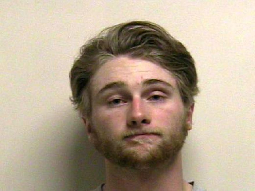 This undated booking photo provided by the Utah County Jail shows Jordan Lindquist, 19, of Saratoga Springs, Utah. Lindquist was taken into custody on Friday, April 17, 2015 on a felony animal cruelty charge. Lindquist was arrested after video footage showed him violently beating a house cat. The cat was seen being shaken, grabbed by the tail, punched in the head and slammed to the ground. (Utah County Jail via AP)