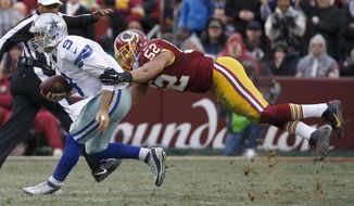 In this photo taken Dec. 28, 2014, Dallas Cowboys quarterback Tony Romo (9) is sacked by Washington Redskins inside linebacker Keenan Robinson (52) during the first half of an NFL football game in Landover, Md. Robinson came away expecting good things after his first chance to hear new Washington Redskins defensive coordinator Joe Barry speak at a team meeting. &amp;quot;I took away just a defense that&#39;s going to be fast and physical, more so than we were last year. And just have a different approach to it. We&#39;re still going to stress everyone flying around, finishing plays, stripping, tackling, all that,&amp;quot; Robinson told reporters on a conference call Monday, the start of offseason workouts in Ashburn, Virginia.  (AP Photo/Alex Brandon)