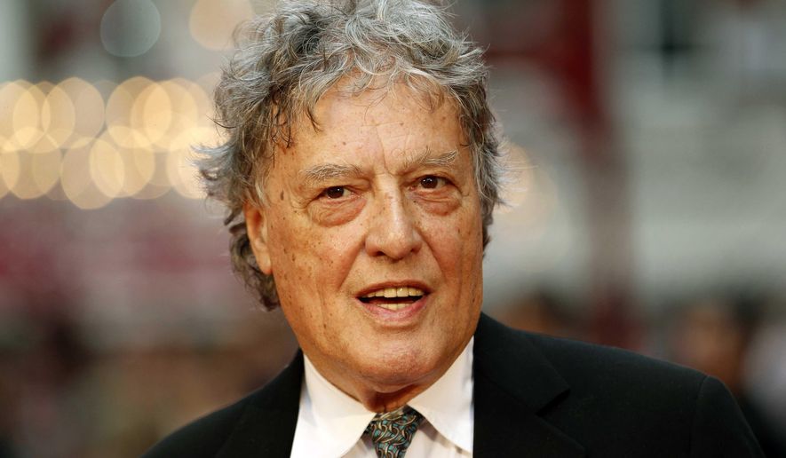 In this Sept. 4, 2012 file photo, British playwright Tom Stoppard poses as he arrives for the world premiere of "Anna Karenina," in London. Stoppard is to accept the PEN/Allen Foundation Literary Service Award, the highest honor bestowed by the American chapter of the global human-rights organization of writers and editors. (AP Photo/Sang Tan, File)