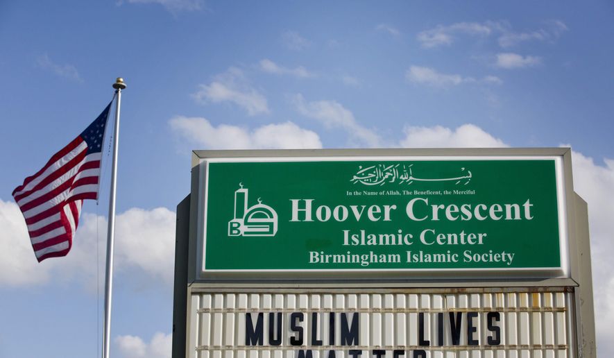 A sign is displayed outside at the Hoover Crescent Islamic Center that says "Muslim Lives Matter," Monday, April 20, 2015, in Hoover, Ala. A spokesperson for a Muslim family in Alabama has confirmed the family’s daughter has fled a Birmingham suburb to join Islamic State militants in Syria after being recruited over the Internet. (AP Photo/Brynn Anderson)