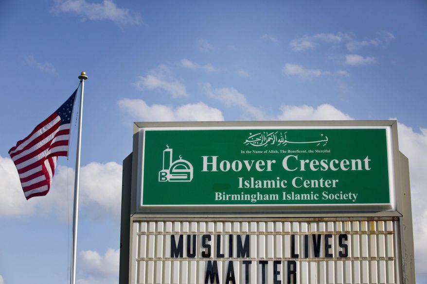 A sign is displayed outside at the Hoover Crescent Islamic Center that says "Muslim Lives Matter," Monday, April 20, 2015, in Hoover, Ala. A spokesperson for a Muslim family in Alabama has confirmed the family’s daughter has fled a Birmingham suburb to join Islamic State militants in Syria after being recruited over the Internet. (AP Photo/Brynn Anderson)