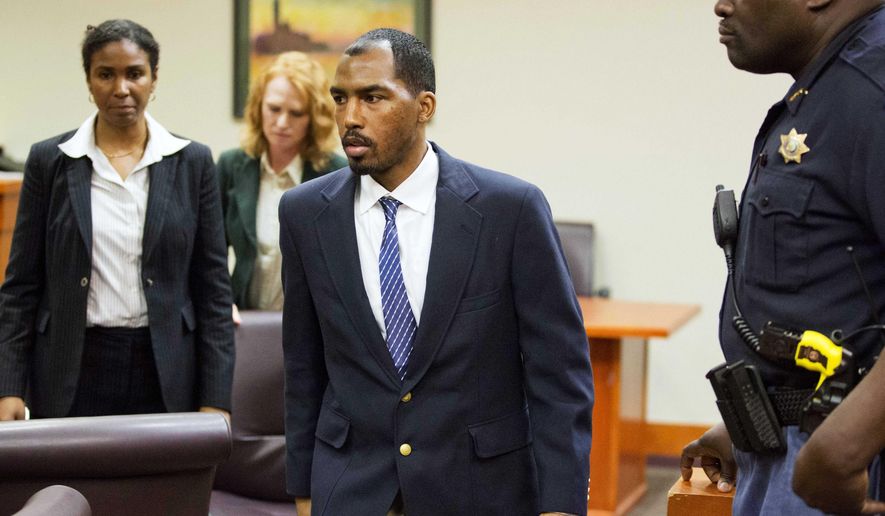Aeman Presley walks out of DeKalb County Superior Court after his first appearance to face charges including malice murder, felony murder and aggravated assault in the deaths of 44-year-old Karen Pearce and 53-year-old Calvin Gholston, Monday, April 20, 2015, in Decatur, Ga. Presley, 34, also faces charges including murder in the killings of two homeless men in Atlanta. The Fulton County and DeKalb County district attorneys have both said they intend to seek the death penalty against him. (AP Photo/David Goldman)