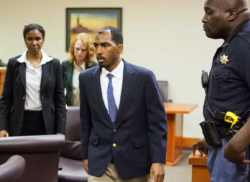 Aeman Presley walks out of DeKalb County Superior Court after his first appearance to face charges including malice murder, felony murder and aggravated assault in the deaths of 44-year-old Karen Pearce and 53-year-old Calvin Gholston, Monday, April 20, 2015, in Decatur, Ga. Presley, 34, also faces charges including murder in the killings of two homeless men in Atlanta. The Fulton County and DeKalb County district attorneys have both said they intend to seek the death penalty against him. (AP Photo/David Goldman)