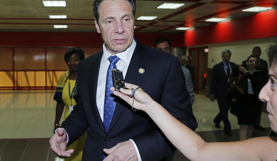 New York Governor Andrew Cuomo answers a journalist's questions as he arrives to Jose Marti airport in Havana, Cuba, Monday, April 20, 2015. Cuomo is the first U.S. governor to visit Cuba since the Dec. 17 declaration of detente. (AP Photo/Desmond Boylan)