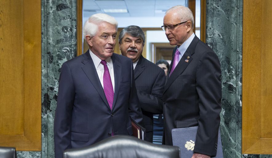Senate Finance Committee Chairman Sen. Orrin Hatch, R-Utah, right, walks into a hearing room on Capitol Hill in Washington, Tuesday, April 21, 2015, with AFL-CIO president Richard Trumka, center, and U.S. Chamber of Commerce President Tom Donohue before the committee&#x27;s hearing on fast track authority. (AP Photo/Evan Vucci) ** FILE **