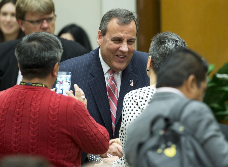 New Jersey Gov. Chris Christie greets attendees of the 45th Annual Washington Conference on the Americas, Tuesday, April 21, 2015, at the State Department in Washington. (AP Photo/Manuel Balce Ceneta)