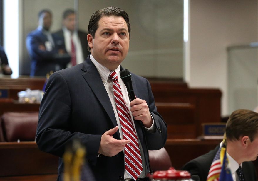 Nevada Senate Majority Leader Michael Roberson, R-Henderson, speaks during Senate floor debate on Gov. Brian Sandoval's tax proposal to overhaul the state's business license fees at the Legislative Building in Carson City, Nev., on Tuesday, April 21, 2015. The Senate approved the measure 17-4 with bipartisan support to reach the required two-thirds majority. (AP Photo /Cathleen Allison)