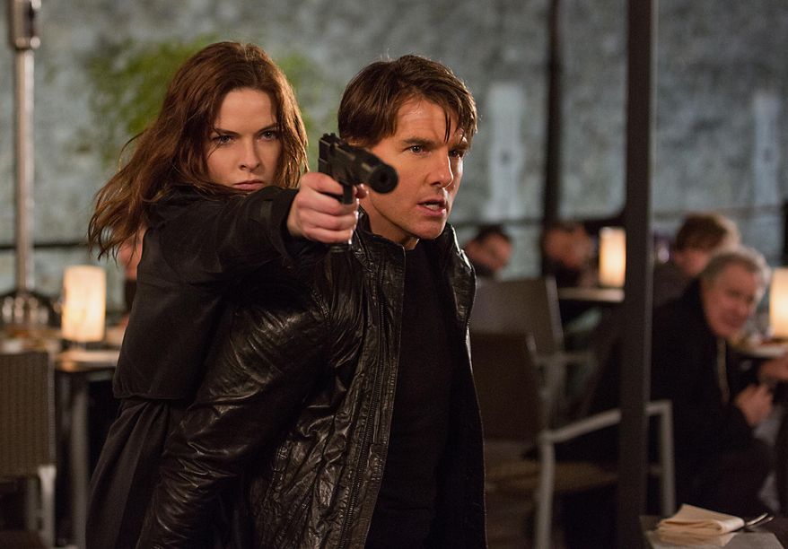 This image released by Paramount Pictures shows Tom Cruise, right, and Rebecca Ferguson in "Mission: Impossible – Rogue Nation," in theaters July 31. (Chiabella James/Paramount Pictures via AP)
