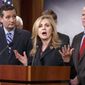 Rep. Marsha Blackburn, R-Tenn., center, flanked by Sen. Ted Cruz, R-Texas, left, and Rep. Mo Brooks, R-Ala., right, joins in criticizing President Barack Obama on immigration, Tuesday, Sept. 9, 2014, during a Republican news conference about the immigration crisis along the U.S.-Mexico border, Capitol Hill in Washington.  (AP Photo/J. Scott Applewhite)