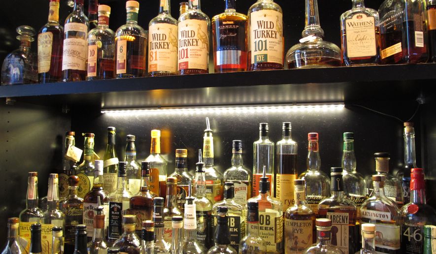 This Sept. 5, 2014, photo shows Sidebar at Whiskey Row, a bar that offers more than 100 bourbons, in the heart of downtown Louisville, Ky. Restaurants along the city's Urban Bourbon Trail are routinely stocked with 50 to 150 varieties of Kentucky's signature spirit. (Associated Press) **FILE**