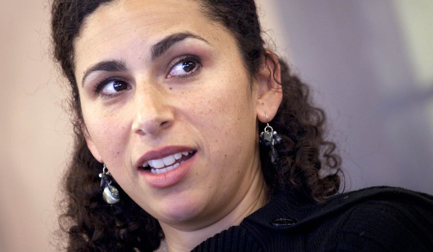 FILE - This Jan. 22, 2013 file photo shows Shoshana Hebshi, of Sylvania, Ohio. The American Civil Liberties Union said Tuesday, April 21, 2015 that the federal government will give Hebshi, who was strip-searched at a Detroit-area airport, $40,000 as compensation for being humiliated. (Kathleen Galligan/Detroit Free Press via AP) DETROIT NEWS OUT; TV OUT; MAGS OUT; NO SALES; MANDATORY CREDIT