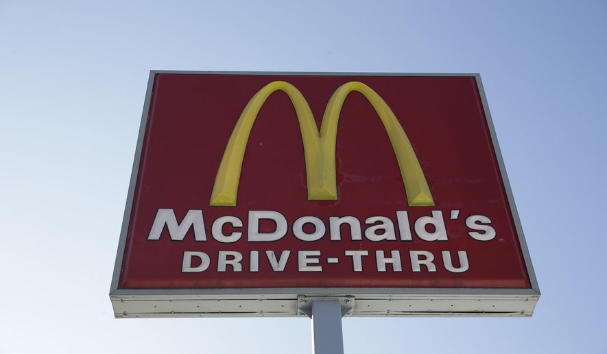 FILE - This Thursday, Jan. 15, 2015, file photo, shows a McDonald's fast food restaurant sign in Chicago. McDonald’s has been hurt by diners who want something different. Sales have been struggling for more than two years and the company seems trapped in a cycle of bad headlines that likely won’t end soon. Despite troubles, McDonald’s is still a powerhouse. (AP Photo/Nam Y. Huh, File)