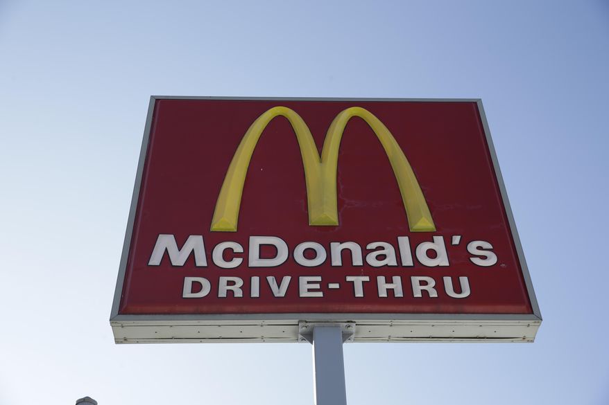 FILE - This Thursday, Jan. 15, 2015, file photo, shows a McDonald's fast food restaurant sign in Chicago. McDonald’s has been hurt by diners who want something different. Sales have been struggling for more than two years and the company seems trapped in a cycle of bad headlines that likely won’t end soon. Despite troubles, McDonald’s is still a powerhouse. (AP Photo/Nam Y. Huh, File)