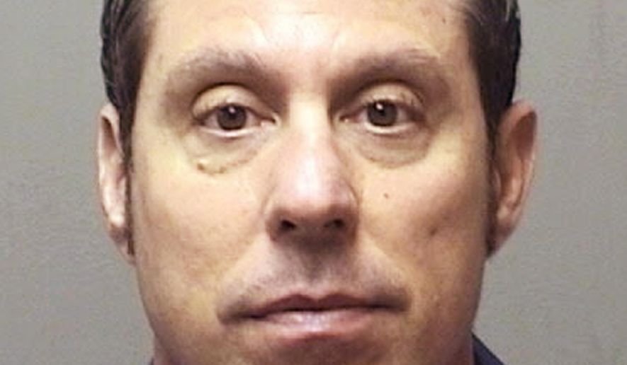 This photo provided April 21, 2015 by the Michigan State Police shows Inkster, Michigan, officer William Melendez. Melendez is charged with assault in the beating of a motorist during a traffic stop in Inkster, Michigan, on Jan. 28. (Michigan State Police via AP)