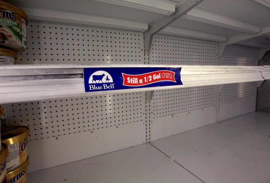 Selves sit empty of Blue Bell ice cream at a grocery store in Dallas, Tuesday, April 21, 2015. Texas-based Blue Bell Creameries issued a voluntary recall Monday, April 20, 2015, for all of its products on the market after two samples of chocolate chip cookie dough ice cream tested positive for Listeriosis. (AP Photo/LM Otero)