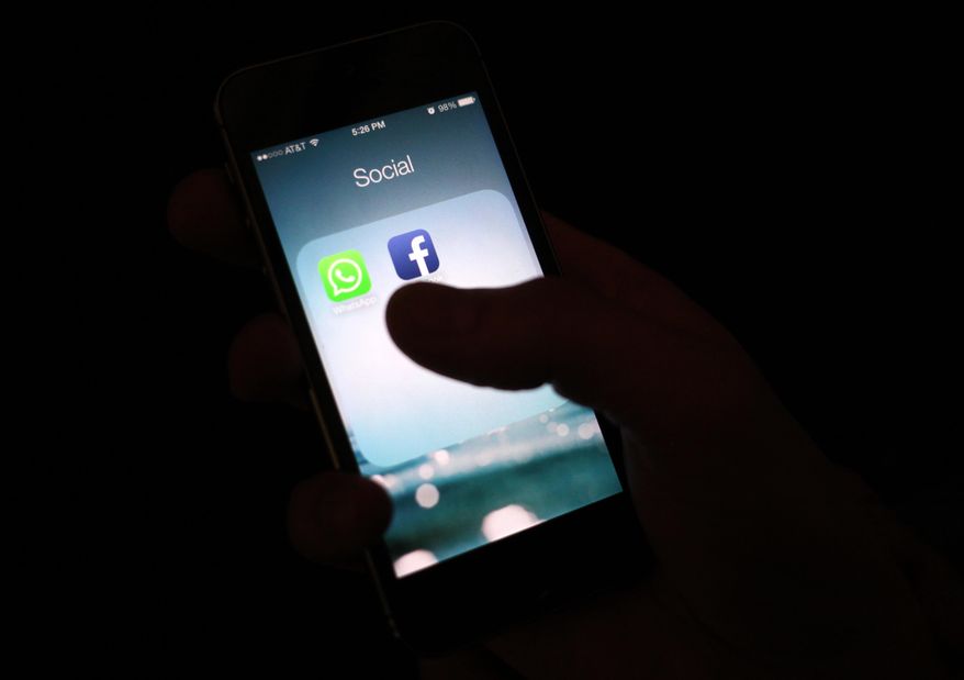 The Facebook app icon on an iPhone. (AP Photo/Karly Domb Sadof, File)
