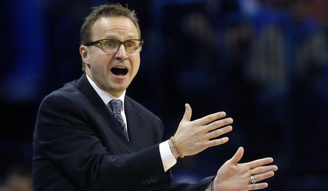 FILE - In this Feb. 25, 2015, file photo, Oklahoma City Thunder coach Scott Brooks gestures to his team during the fourth quarter of an NBA basketball game against the Indiana Pacers in Oklahoma City. The Thunder fired Brooks on Wednesday, April 22, 2015. (AP Photo/Sue Ogrocki, File0