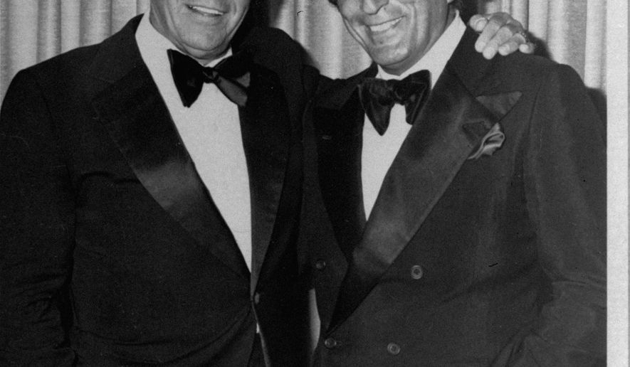 FILE - In this July 1980 file photo, Frank Sinatra, left, poses with Tony Bennett in Reno, Nev. "He changed my whole career," the 88-year-old Bennett said of Sinatra at the Tribeca Film Festival tribute on Tuesday, April 21, 2015, part of a yearlong Sinatra centennial celebration that also included a screening of the digitally restored Sinatra-Gene Kelly favorite and love letter to New York "On the Town." (AP Photo/FILE)