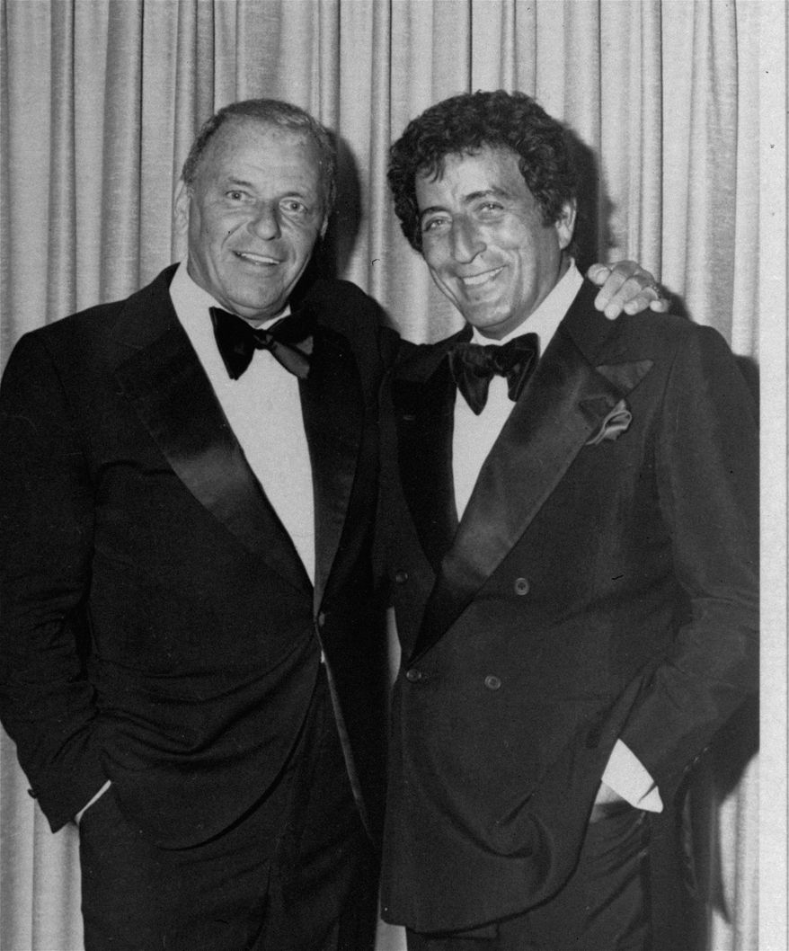 FILE - In this July 1980 file photo, Frank Sinatra, left, poses with Tony Bennett in Reno, Nev. "He changed my whole career," the 88-year-old Bennett said of Sinatra at the Tribeca Film Festival tribute on Tuesday, April 21, 2015, part of a yearlong Sinatra centennial celebration that also included a screening of the digitally restored Sinatra-Gene Kelly favorite and love letter to New York "On the Town." (AP Photo/FILE)