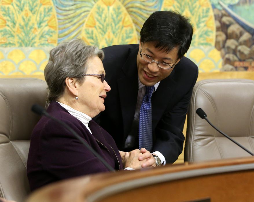 State Sen. Richard Pan, D-Sacramento, thanks Sen. Loni Hancock, D-Berkeley after she joined other members of the Senate Education Committee in approving his measure requiring California schoolchildren to get vaccinated, at the Capitol in Sacramento, Calif., Wednesday, April 22, 2015. The measure SB277 was approved on a 7-2 vote after amendments were made to the bill that allows families who chose to not vaccinate to homeschool children together and allows independent study. The bill now goes to the Senate Judiciary Committee. (AP Photo/Rich Pedroncelli)
