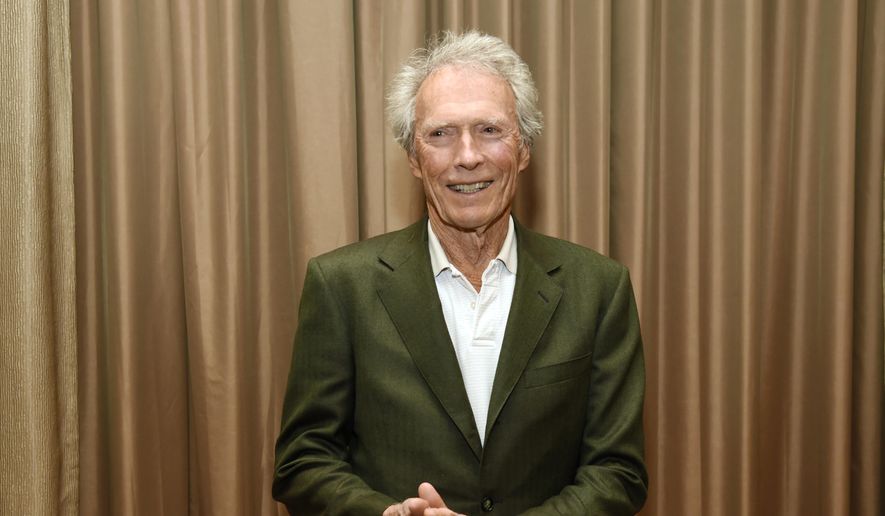 Filmmaker Clint Eastwood poses for a photo op before &quot;The Legend of Cinema Luncheon: A Salute to Clint Eastwood&quot; during CinemaCon 2015 at Caesars Palace on Wednesday, April 22, 2015, in Las Vegas. (Photo by Chris Pizzello/Invision/AP)