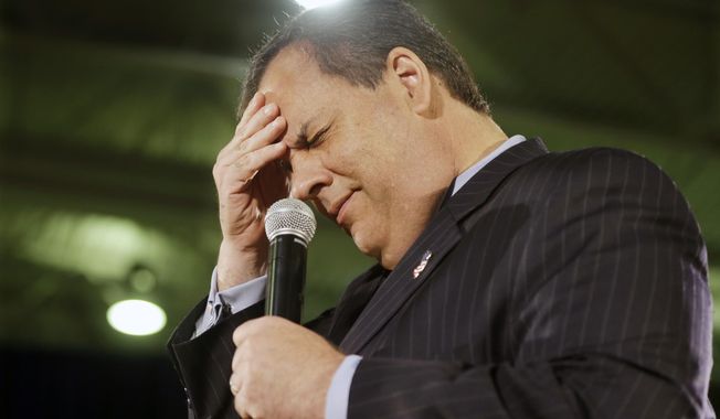 New Jersey Gov. Chris Christie reacts after he thought it was Wednesday and the crowd corrected him as he addressed a gathering during a town hall meeting in Cedar Grove, N.J., on April 23, 2015. (Associated Press) **FILE**