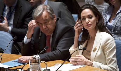 U.N. Special Envoy for Refugees and Hollywood star Angelina Jolie, right, and U.N. High Commissioner for Refugees António Guterres, left, brief the U.N. Security Council on Syria&#39;s refugee crisis, Friday, April 24, 2015. (AP Photo/Bebeto Matthews)