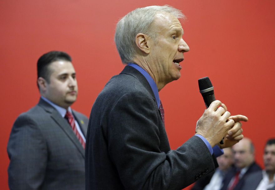 FILE - In this March 20, 2015 file photo, Illinois Republican Gov. Bruce Rauner speaks at an event in Chicago. Cuts to Medicaid will make up about one-third of the $300 million in spending reductions by Gov. Rauner's office as part of a budget fix for this fiscal year. Rauner's office shared a letter Thursday, April, 23, 2015, detailing the $106 million in cuts to service providers in the health care program for the poor. The governor's office says the providers' reimbursement rates will reduced by 16.75 percent. Hospital and mental health services will be exempt from reductions. (AP Photo/M. Spencer Green, File)