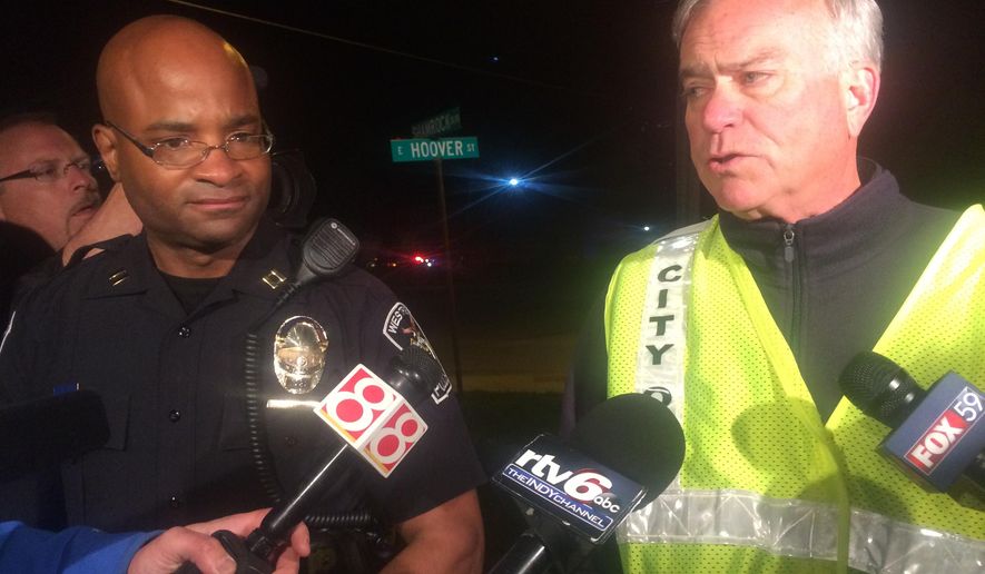 Capt. Charles Hollowell, left,  of the Westfield Police Department said Thursday night April 24, 2015 that authorities don&#39;t have an exact number of injuries but are certain more than 12 were hurt. He says at least one person was critically injured after the stage gave way at Westfield High School. At right Andy Cook mayor of Westfield. (AP Photo/Lauryn Schroeder)