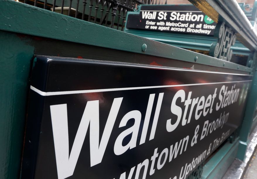 FILE - This Oct. 2, 2014 file photo shows the Wall Street subway stop on Broadway, in New York&#x27;s Financial District. Stocks turned higher in European trading on Friday, April 24, 2015, despite a lack of progress on Greece&#x27;s bailout.  (AP Photo/Richard Drew)