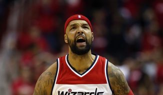 Washington Wizards forward Drew Gooden (90) celebrates during the first half of Game 3 in the first round of the NBA basketball playoffs against the Toronto Raptors, Friday, April 24, 2015, in Washington. (AP Photo/Alex Brandon) **FILE**