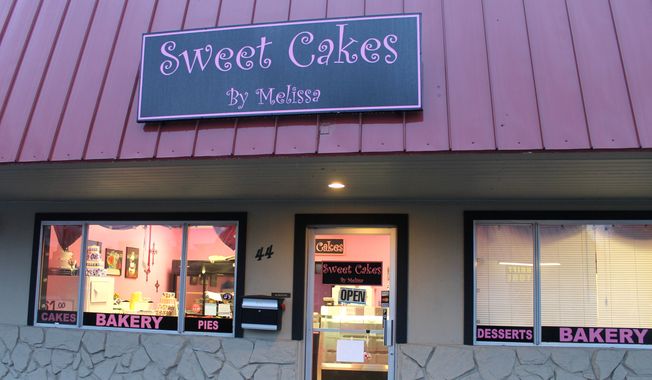 This Feb. 5, 2013, photo shows Sweet Cakes by Melissa in Gresham,Ore. An administrative law judge proposed Friday, April 24, 2015, that the owners of the suburban Portland bakery pay $135,000 to a lesbian couple who were refused service more than two years ago. The judge, Alan McCullough, ruled in January that Sweet Cakes by Melissa discriminated against Laurel and Rachel Bowman-Cryer by refusing to bake them a wedding cake. The bakers cited their religious beliefs in a case that has been cited in the national debate over religious freedom and discrimination against gays. (Everton Bailey Jr./The Oregonian via AP)