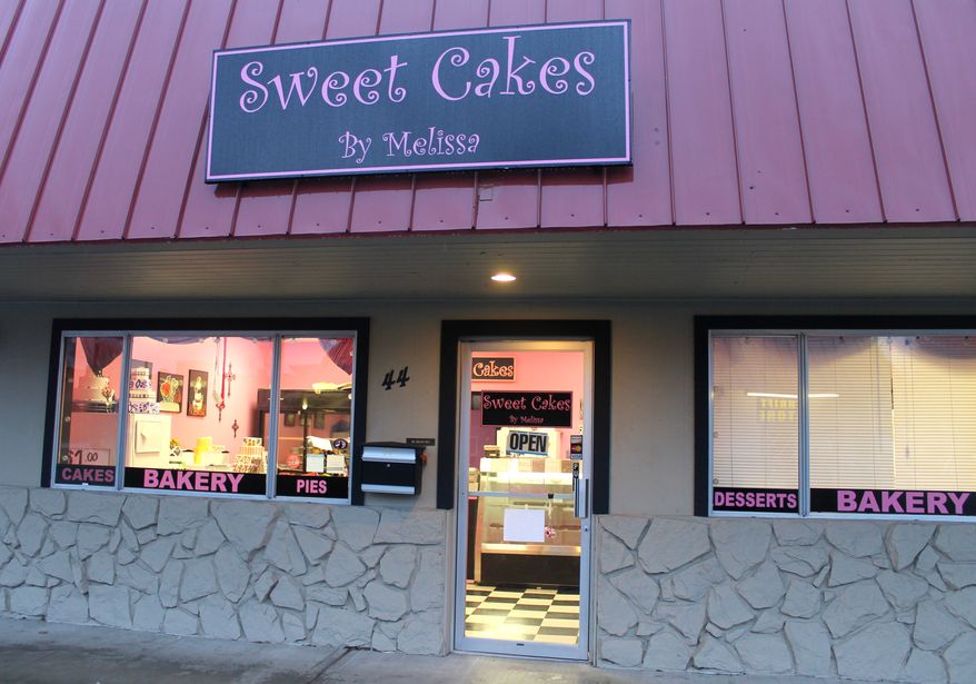 This Feb. 5, 2013, photo shows Sweet Cakes by Melissa in Gresham,Ore. An administrative law judge proposed Friday, April 24, 2015, that the owners of the suburban Portland bakery pay $135,000 to a lesbian couple who were refused service more than two years ago. The judge, Alan McCullough, ruled in January that Sweet Cakes by Melissa discriminated against Laurel and Rachel Bowman-Cryer by refusing to bake them a wedding cake. The bakers cited their religious beliefs in a case that has been cited in the national debate over religious freedom and discrimination against gays. (Everton Bailey Jr./The Oregonian via AP)
