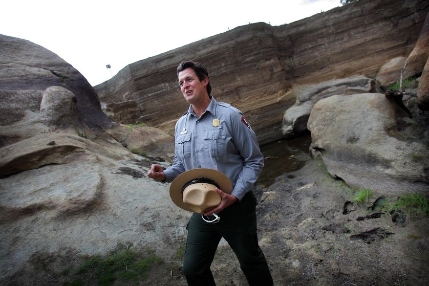 Ranger Jay Theuer stands at Barker Dam in Joshua Tree National Park. (Kurt Miller/The Press-Enterprise via AP)