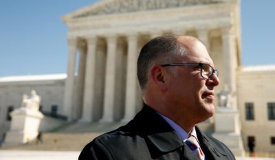 In this March 6, 2015, photo, James Obergefell speaks to a member of the media after joining the Human Rights Campaign as they deliver what they say are 207,551 copies of the “People’s Brief” that calls for full nationwide marriage equality, to the U.S. Supreme Court in Washington. Obergefell is the named plaintiff in Obergefell v. Hodges, a marriage equality case set to be heard by the U.S. Supreme Court on April 28. (AP Photo/Andrew Harnik)