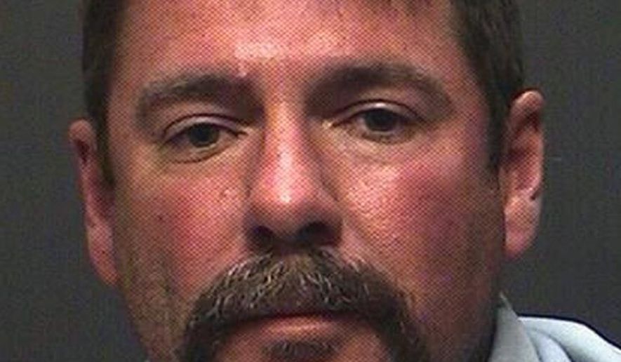 This April 26, 2015 photo provided by the Pima County Sheriff's Department shows David Dwayne Watson in Tucson, Ariz. Watson, 46, is being charged with the August 2000 killing of his ex-wife and the later killings of his former mother-in-law and a third woman. (Pima County Sheriff's Department via AP)