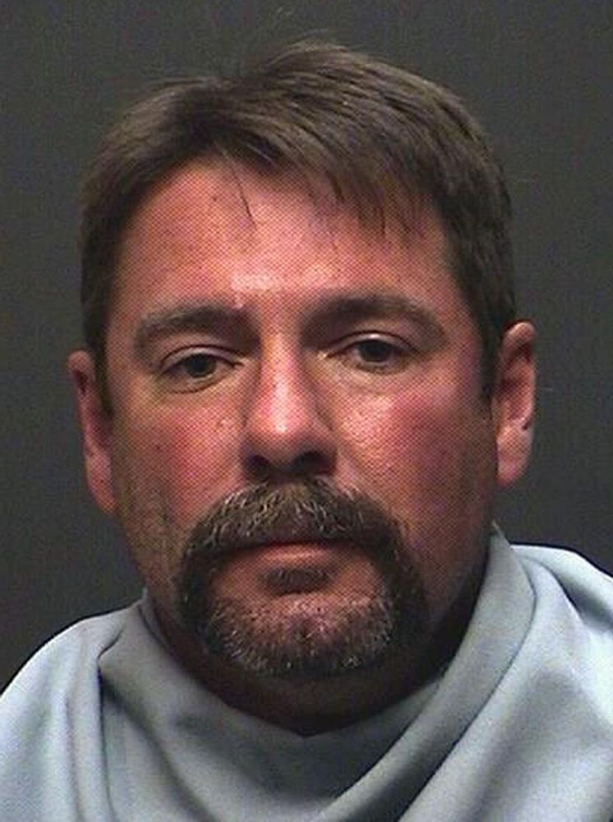 This April 26, 2015 photo provided by the Pima County Sheriff's Department shows David Dwayne Watson in Tucson, Ariz. Watson, 46, is being charged with the August 2000 killing of his ex-wife and the later killings of his former mother-in-law and a third woman. (Pima County Sheriff's Department via AP)