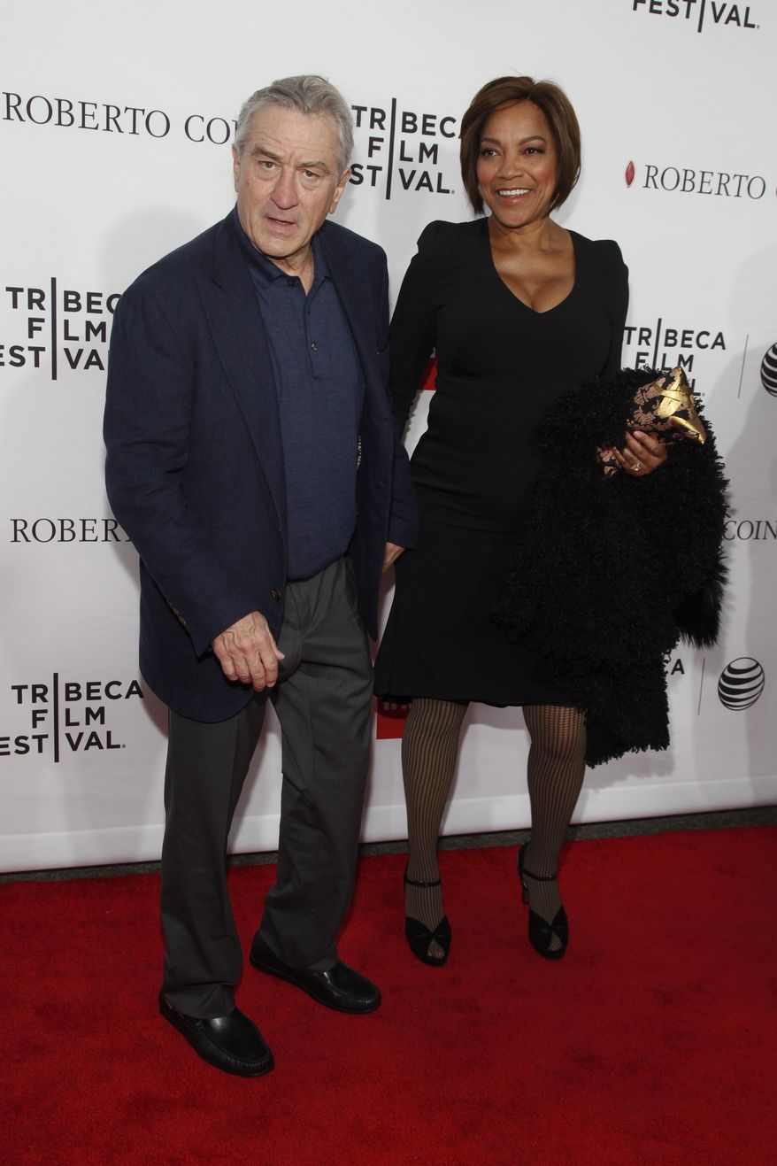 Robert De Niro, left, and Grace Hightower, right, attend a Tribeca Film Festival closing night special screening of "Goodfellas" at the Beacon Theater on Saturday, April 25, 2015, in New York. (Photo by Andy Kropa/Invision/AP)