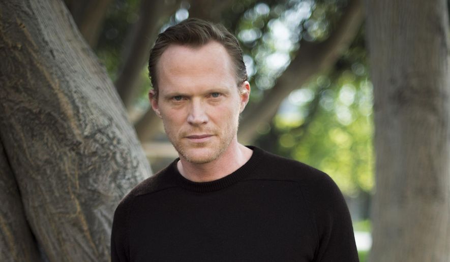 In this Saturday, April 11, 2015 photo, Paul Bettany poses during a portrait session for "Avengers: Age of Ultron" at Walt Disney Studios in Burbank, Calif . After portraying the voice of Tony Stark's operating system sidekick J.A.R.V.I.S. in Marvel films for the past seven years, Bettany is in front of the camera for the first time as the mysterious Vision in "Avengers: Age of Ultron." The movie releases in the United States, on May 1, 2015. (Photo by Jordan Strauss/Invision/AP, File)