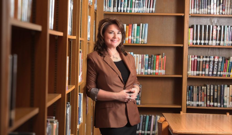 In this Jan. 29, 2015 photo provided by the Amarillo (Texas) Independent School District, Palo Duro High School English teacher Shanna Peeples poses for a photo. Peeples has been named 2015 National Teacher of the Year by the Council of Chief State School Officers. (Davy Knapp/Amarillo ISD via AP) “Shanna Classroom Photo” – October 29, 2014 All other photos – January 29, 2015 Video – April 14, 2015