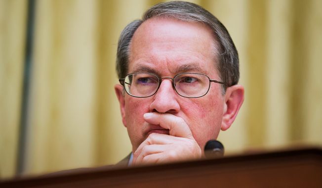 House Judiciary Committee Chairman Rep. Bob Goodlatte, R-Va. listens to the testimony of Attorney General Eric Holder, during the committee&#x27;s hearing  on the oversight of the Justice Department, Tuesday, April 8, 2014, on Capitol Hill in Washington.  (AP Photo/Manuel Balce Ceneta)