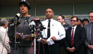 Baltimore Mayor Stephanie Rawlings-Blake, left, speaks at a news conference about the situation in Baltimore with Baltimore&#39;s Police Commissioner Anthony Batts, center, Tuesday, April 28, 2015. Baltimore was a city on edge as hundreds of National Guardsmen patrolled the streets against unrest for the first time since 1968, hoping to prevent another outbreak of rioting. (AP Photo/Jessica Gresko)
